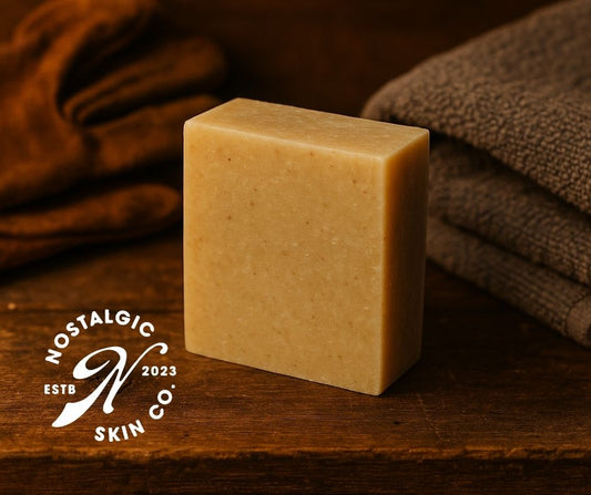 natural soap bar on a rugged workbench with gym towel and gloves
